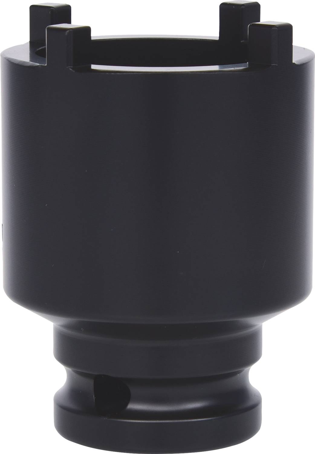 Une pièce métallique noire cylindrique avec quatre rainures en haut, probablement destinée à des applications techniques ou mécaniques.