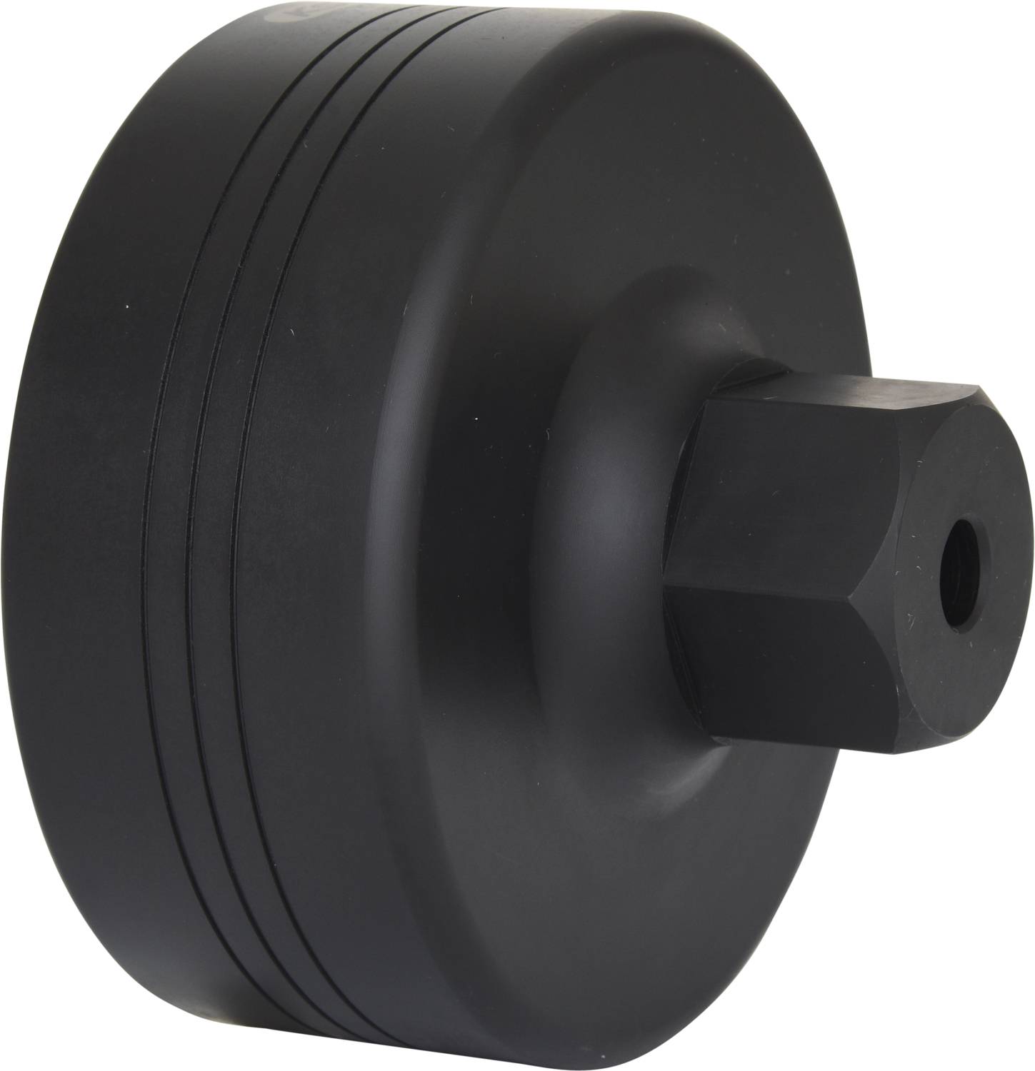 Un outil noir en forme de disque avec un embout hexagonal, probablement un extracteur pour des applications mécaniques.