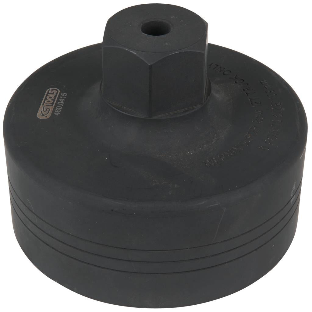 Adaptateur métallique noir et rond avec une ouverture hexagonale sur le dessus. Sert d'accessoire pour outils, probablement destiné à des applications spécifiques.