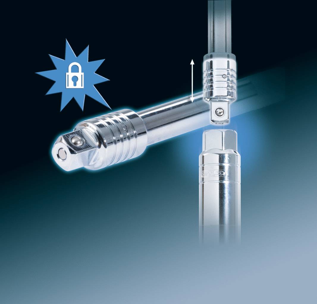 Une tête d'outil chromée avec un mécanisme de verrouillage est mise en évidence. Une flèche indique la direction du mouvement. Un symbole de cadenas représente la sécurité.