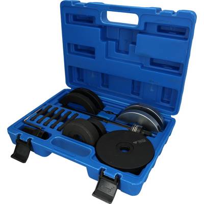 Une valise bleue ouverte montre un ensemble d'haltères avec des poids de différentes tailles et des barres d'haltérophilie.