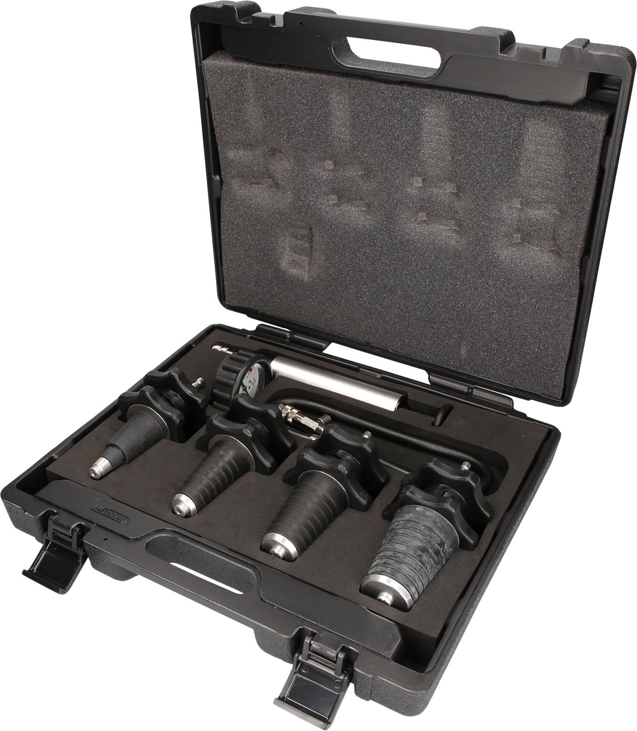 Une valise noire ouverte présente un ensemble d'outils précis composé de quatre instruments, d'un manomètre et de tuyaux disposés dans un compartiment en mousse.