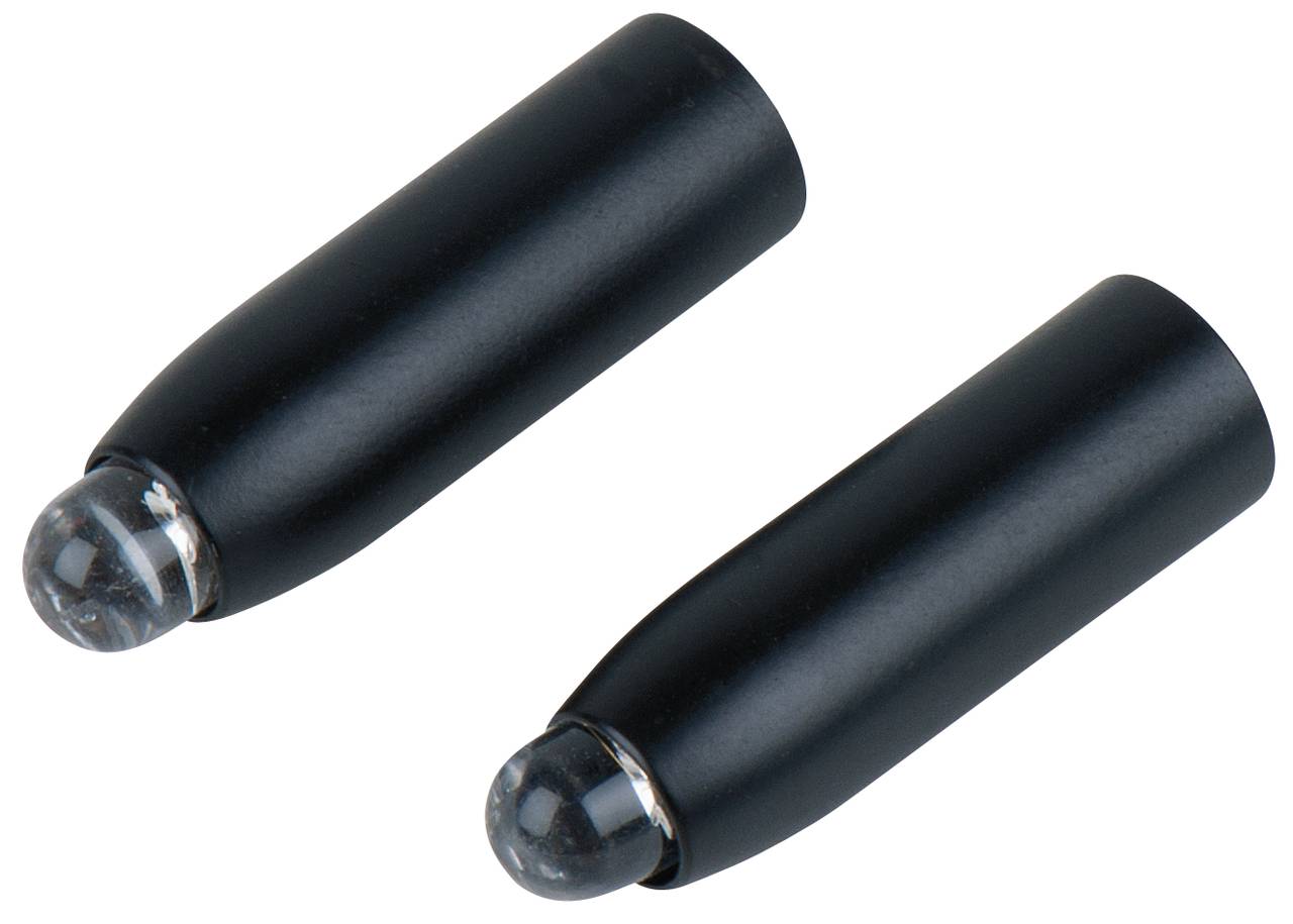 Deux objets noirs cylindriques avec une extrémité ronde transparente. Ils sont posés côte à côte sur une surface blanche.