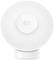 Lampe LED blanche, ronde, avec le logo 'mi' au centre. Elle présente une forme simple et moderne.