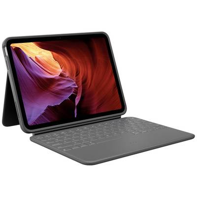 Une tablette avec un clavier amovible affiche un motif d'ondes colorées sur l'écran.