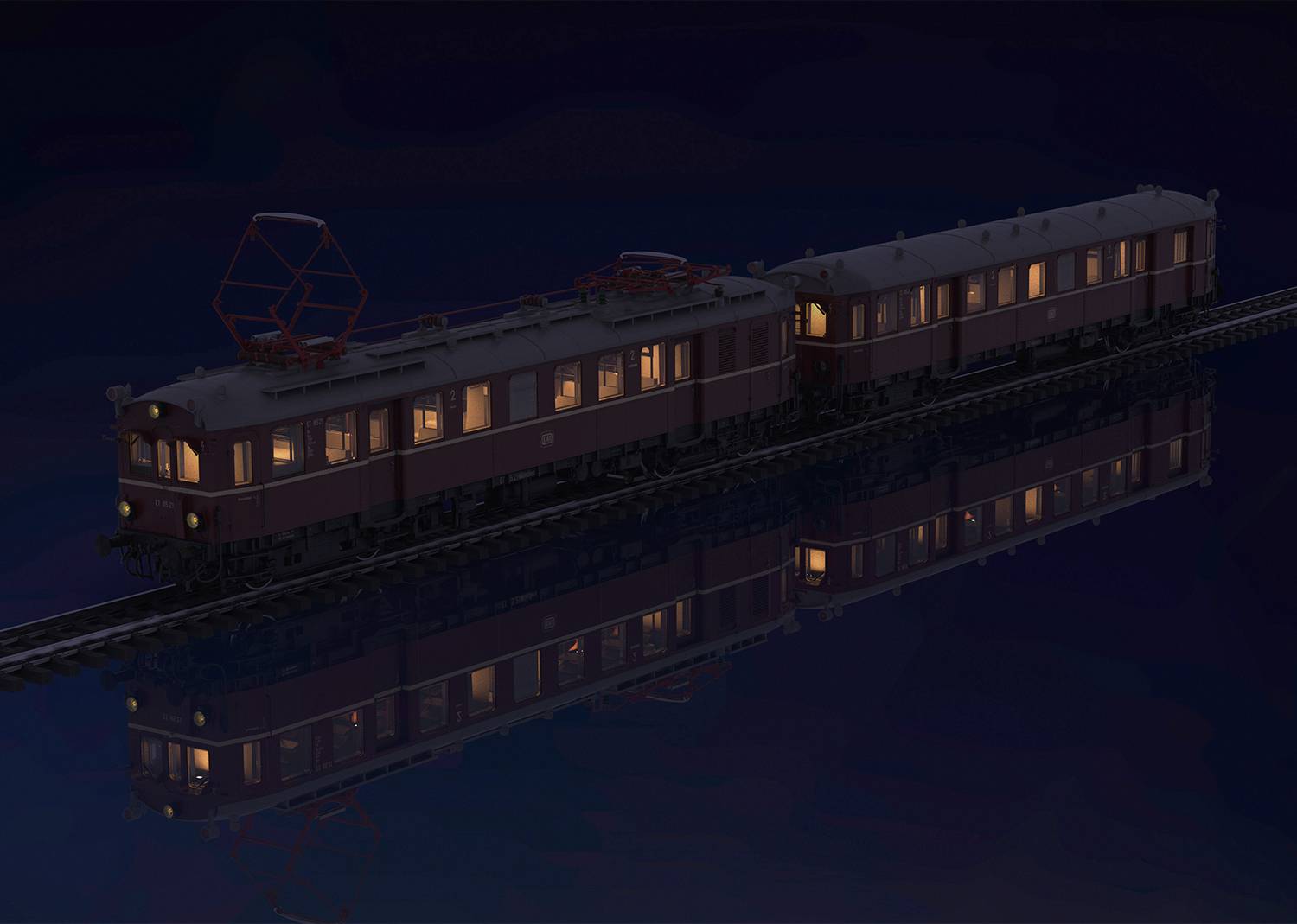 Un train illuminé de nuit se reflète dans l'eau. Le train est composé de deux wagons et circule sur une voie ferrée sous un ciel dégagé.