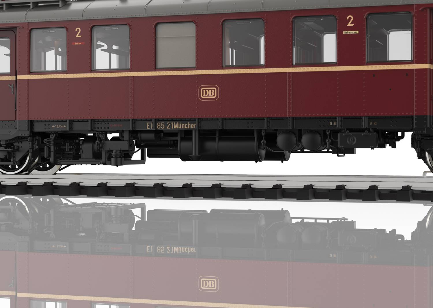 Une voiture de chemin de fer historique rouge de la Deutsche Bahn, de deuxième classe, est stationnée sur des rails. La voiture est richement détaillée.