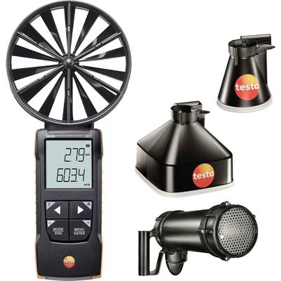 Appareil de mesure du flux d'air avec un grand ventilateur et un affichage numérique indiquant '2,79 m/s' et '600,34 m³/h'. Trois embouts différents sont posés à côté.