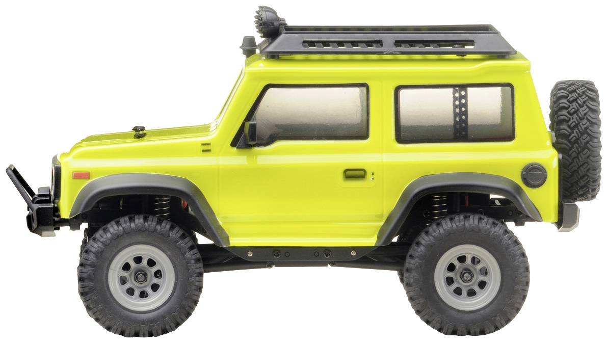 Un véhicule tout-terrain jouet jaune avec de grandes roues et des détails noirs, photographié de côté.