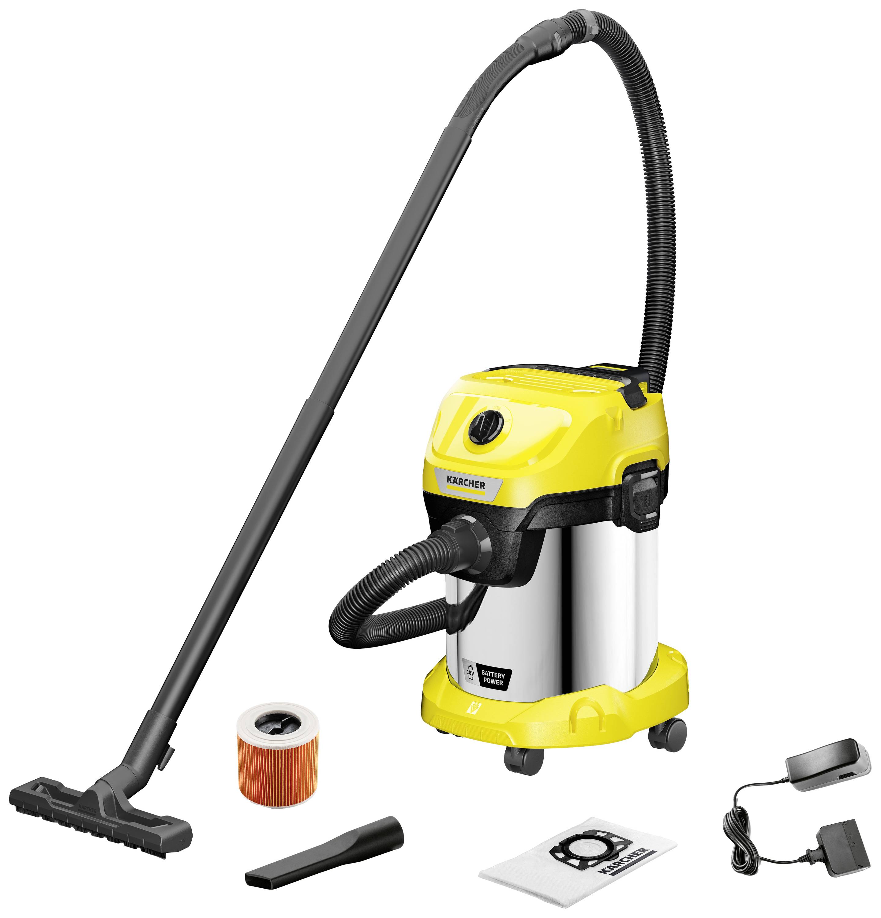 Un aspirateur jaune eau/poussière avec accessoires, comprenant une buse de sol, un filtre, un embout de buses, un sac à poussière et un câble.