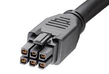 Un connecteur électrique noir à six broches, typique du matériel informatique, est montré de dessus.