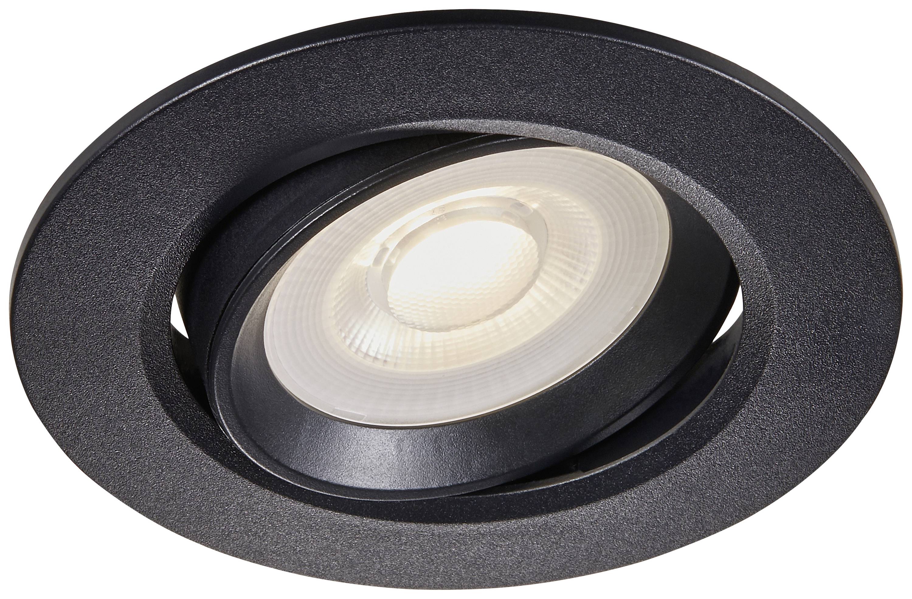 Spot encastrable avec boîtier noir et lampe LED diffusant une lumière blanc chaud.