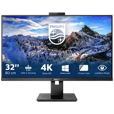 Moniteur Philips 4K de 32 pouces avec station d'accueil USB-C, Windows Hello, écran sans scintillement et mode LowBlue, devant un paysage de montagne.