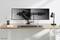 Deux supports de moniteurs vides sur un bureau avec une lampe, un clavier et un ordinateur portable. Design de bureau épuré et moderne.