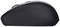 Souris d'ordinateur sans fil noire, vue latérale, design ergonomique, surface lisse et épurée.