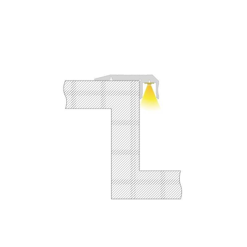 Coupe transversale d'un mur avec une lampe installée, projetant sa lumière vers le bas pour éclairer la zone située en dessous.