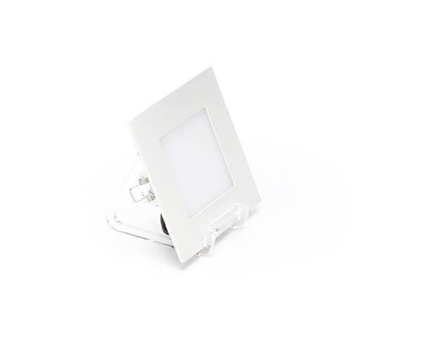 Panneau LED carré blanc, positionné sur le côté, montrant les connexions de câbles à l'arrière. Idéal pour une installation au plafond ou dans les murs.