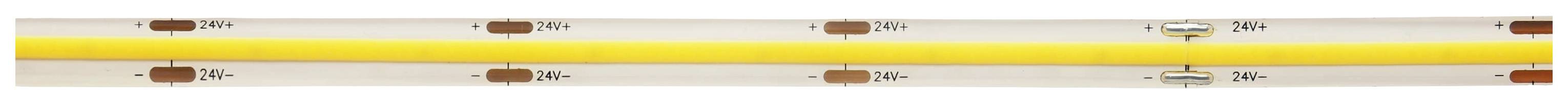 Un tuyau jaune adjacent avec des clips de fixation marron et gris, utilisé pour les systèmes de refroidissement ou de chauffage.