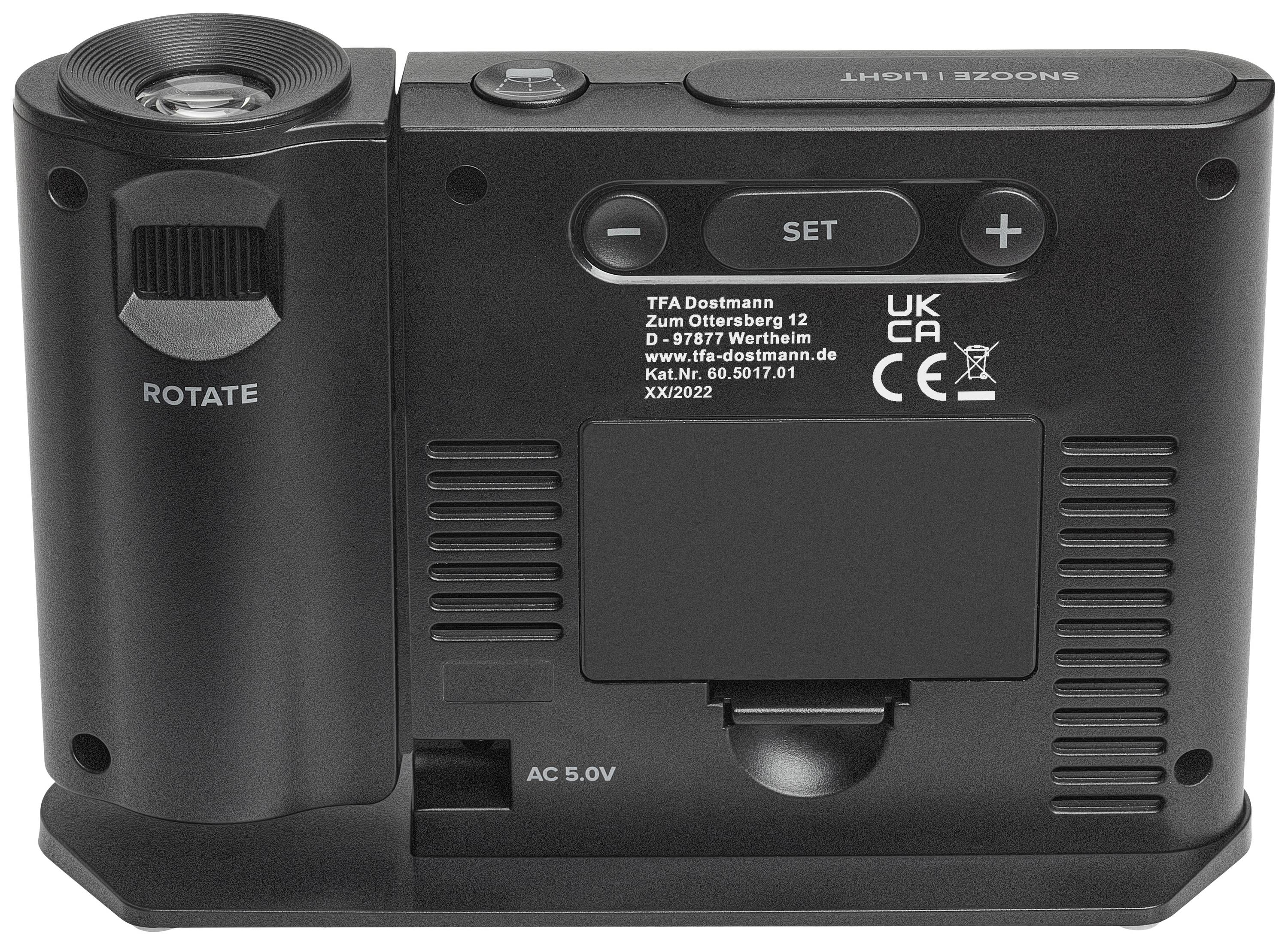 Station météorologique numérique sans fil avec projecteur et port USB. Le dos présente les commandes et les spécifications techniques.