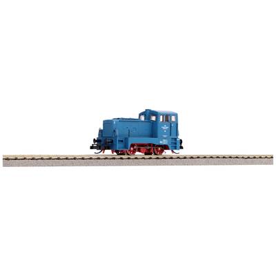 Une locomotive-modèle bleue sur une section de voie ferrée. La locomotive a des roues rouges et un design compact.