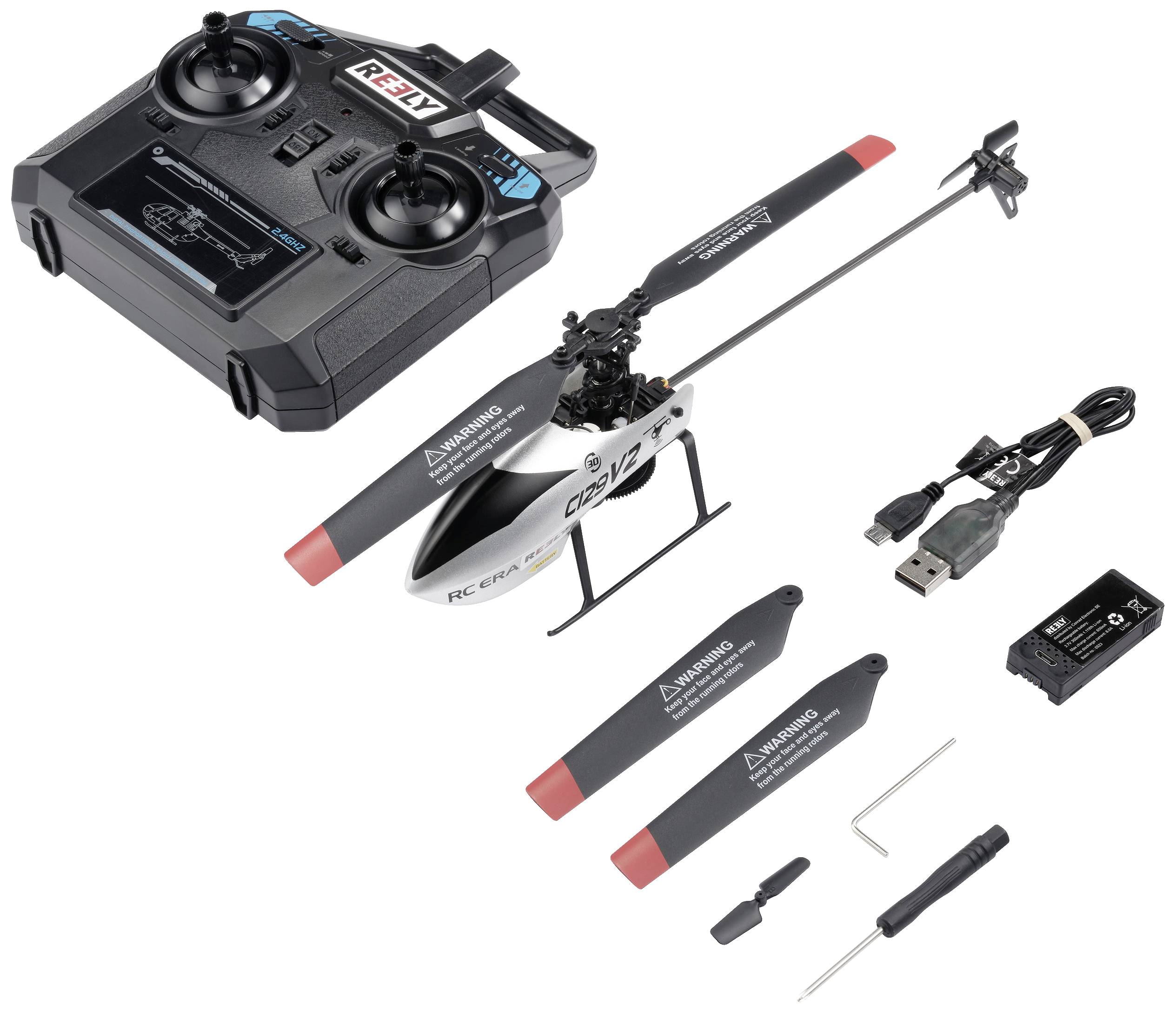 Un ensemble d'hélicoptère télécommandé RC, comprenant une télécommande, des pièces de rechange, un câble de chargement USB et des outils. L'hélicoptère possède des pales rouge et noir.