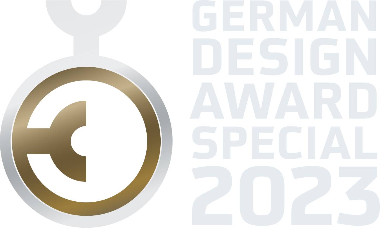 Logo 'German Design Award Special 2023' avec un emblème de designer stylisé en argent et bronze.