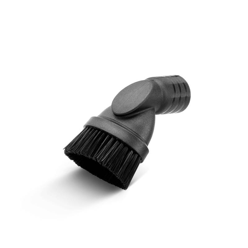 Un accessoire rond et noir pour aspirateur, muni de poils, probablement utilisé pour nettoyer des surfaces telles que les meubles rembourrés ou les tapis.