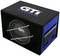 Caisson de basses noir avec texte bleu 'GTI Crunch'. La face avant présente le haut-parleur, tandis que le côté arrière abrite l'électronique pour l'amplification audio.