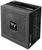 L'image montre un boîtier d'alimentation noir Thermaltake Toughpower PF3 1200W avec une grille de ventilation sur le côté et des informations sur l'emballage.