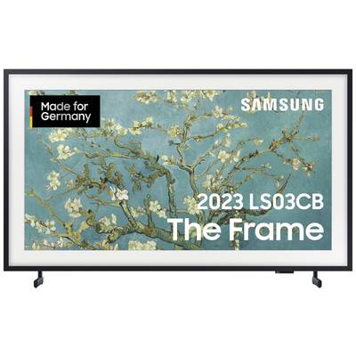 Un téléviseur Samsung 'The Frame' avec une image de branches d'amandier en fleurs. En haut à gauche, il est écrit 'Made for Germany'.