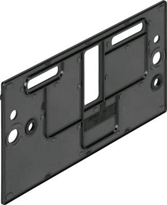 Pièce rectangulaire noire en plastique comportant plusieurs ouvertures et découpes, probablement une plaque de fixation ou un élément de montage.
