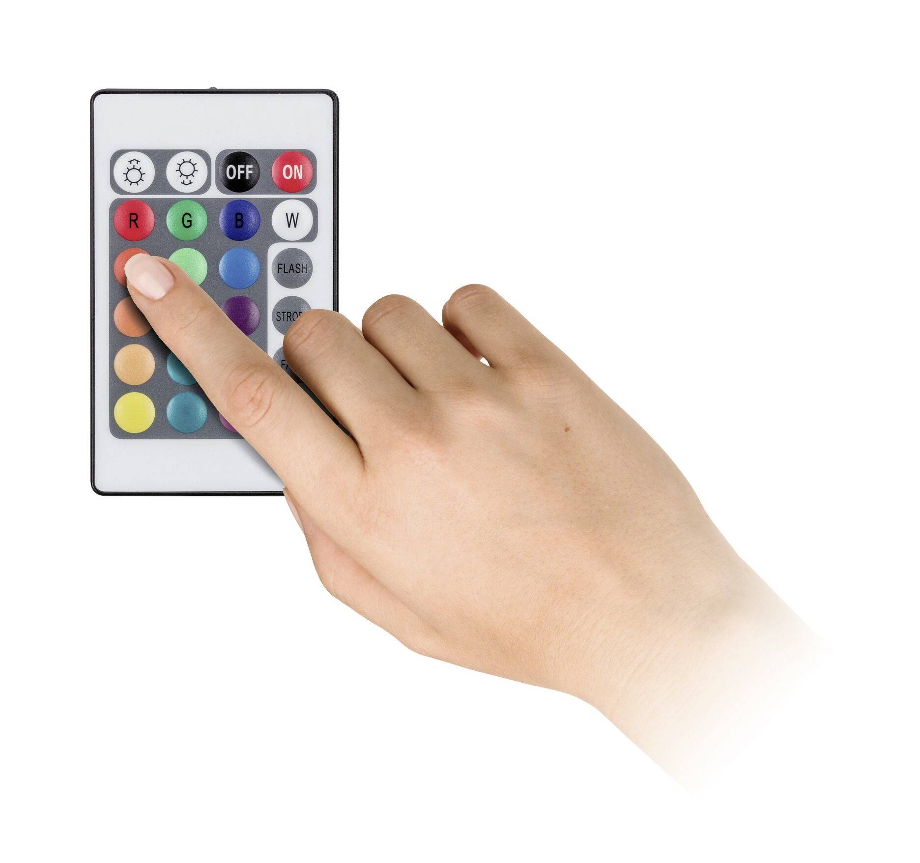 Une main appuie sur le bouton rouge d'une télécommande comportant de nombreuses touches colorées.