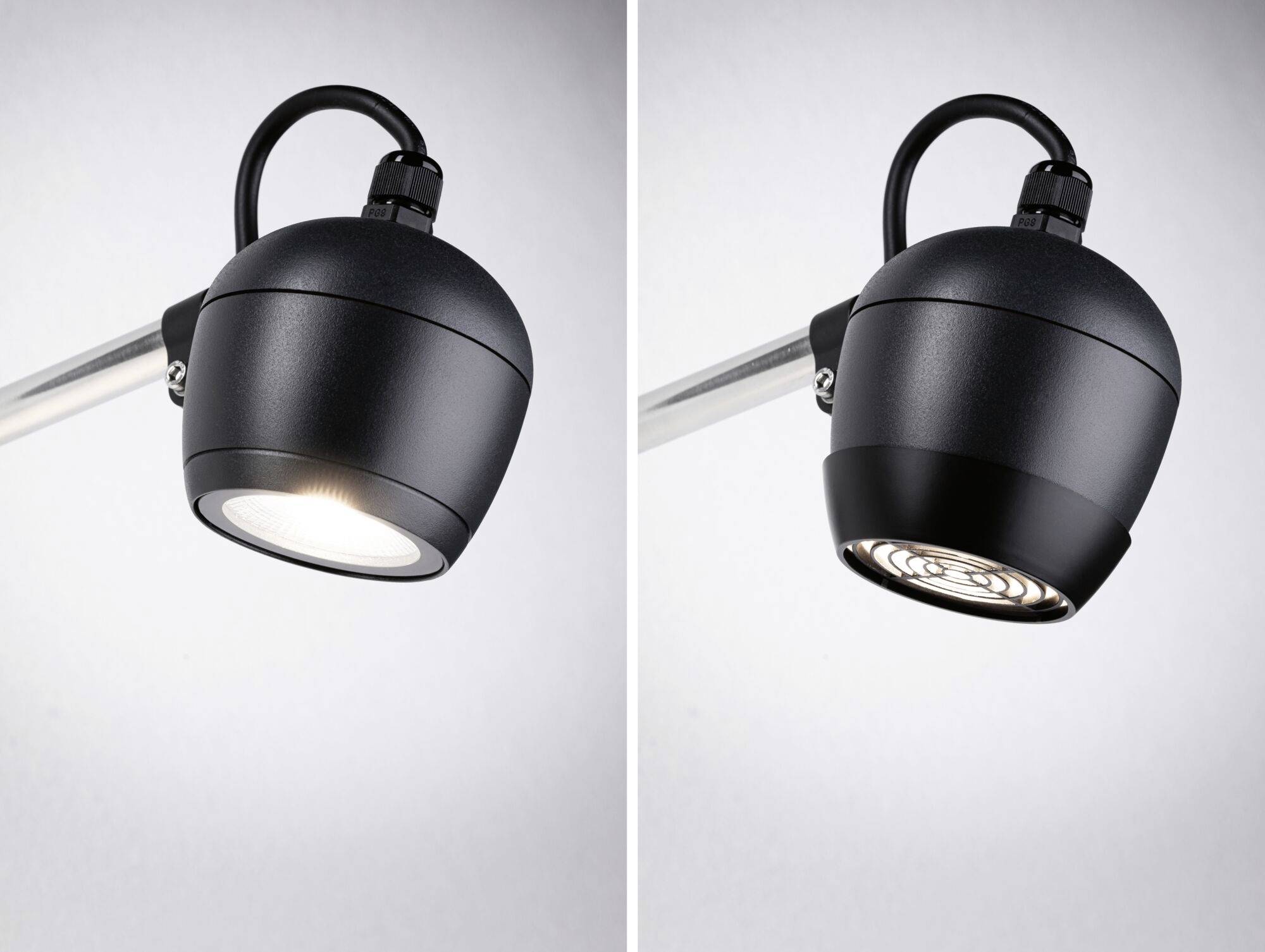 Deux spots de plafond noirs et ronds côte à côte, celui de gauche allumé avec de la lumière visible, celui de droite éteint.