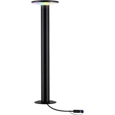 Une lampe sur pied noire avec un socle rond et un sommet lumineux qui diffuse des rayons dans différentes couleurs. Câble avec fiche à la base.