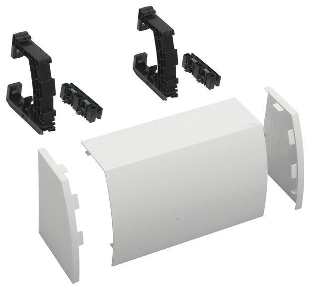 Pièces détachées d'un objet : boîtier blanc, supports noirs. Ensemble de pièces de montage ou de rechange avec composants en plastique.