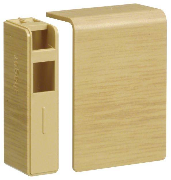Un adaptateur en plastique rectangulaire de couleur bois et une plaque de couverture assortie, pouvant ensemble couvrir un système de câblage.