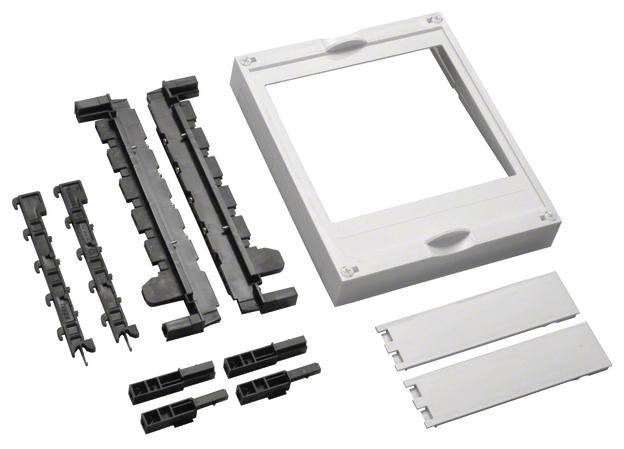 Kit de montage comprenant divers éléments en plastique noir et gris pour l'installation, dont la pièce principale est un cadre rectangulaire.