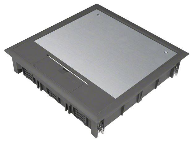 Un boîtier de sol rectangulaire en noir et gris. Il dispose d'un couvercle amovible et est fréquemment utilisé pour la gestion des câbles.