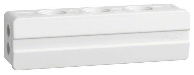 Une pièce rectangulaire blanche en plastique avec plusieurs ouvertures rondes sur sa surface supérieure, utilisée pour des connexions électriques.