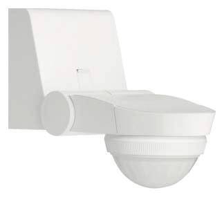Un détecteur de mouvement blanc pour montage mural, adapté à la surveillance de zones à l'intérieur des bâtiments à des fins de sécurité ou d'éclairage.