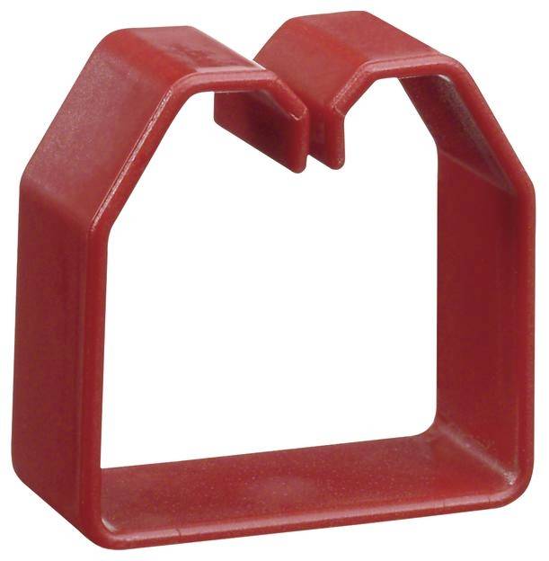 Emporte-pièce en plastique rouge en forme de maison.