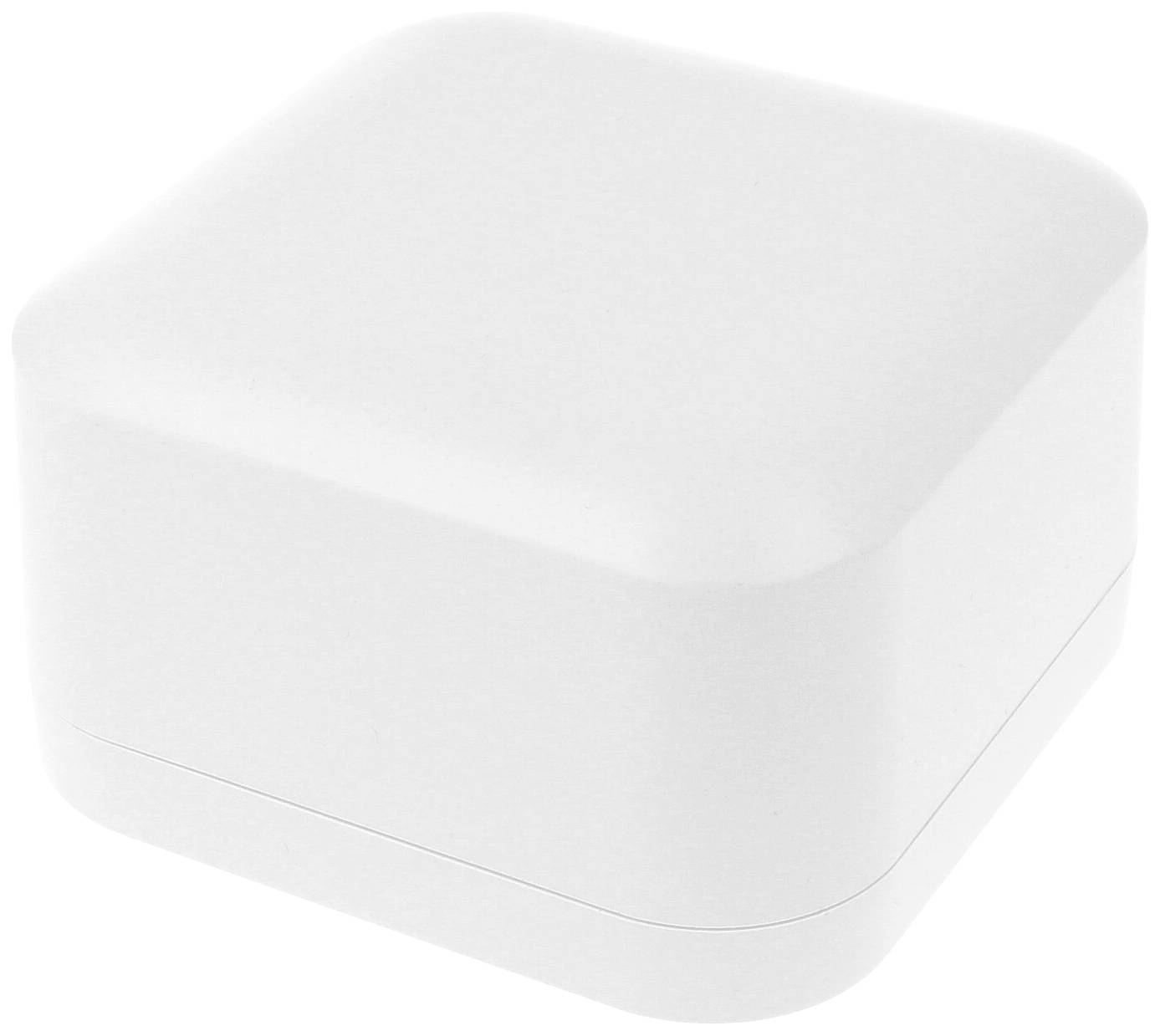 Un récipient carré blanc aux coins arrondis, probablement un emballage compact ou une boîte de rangement.