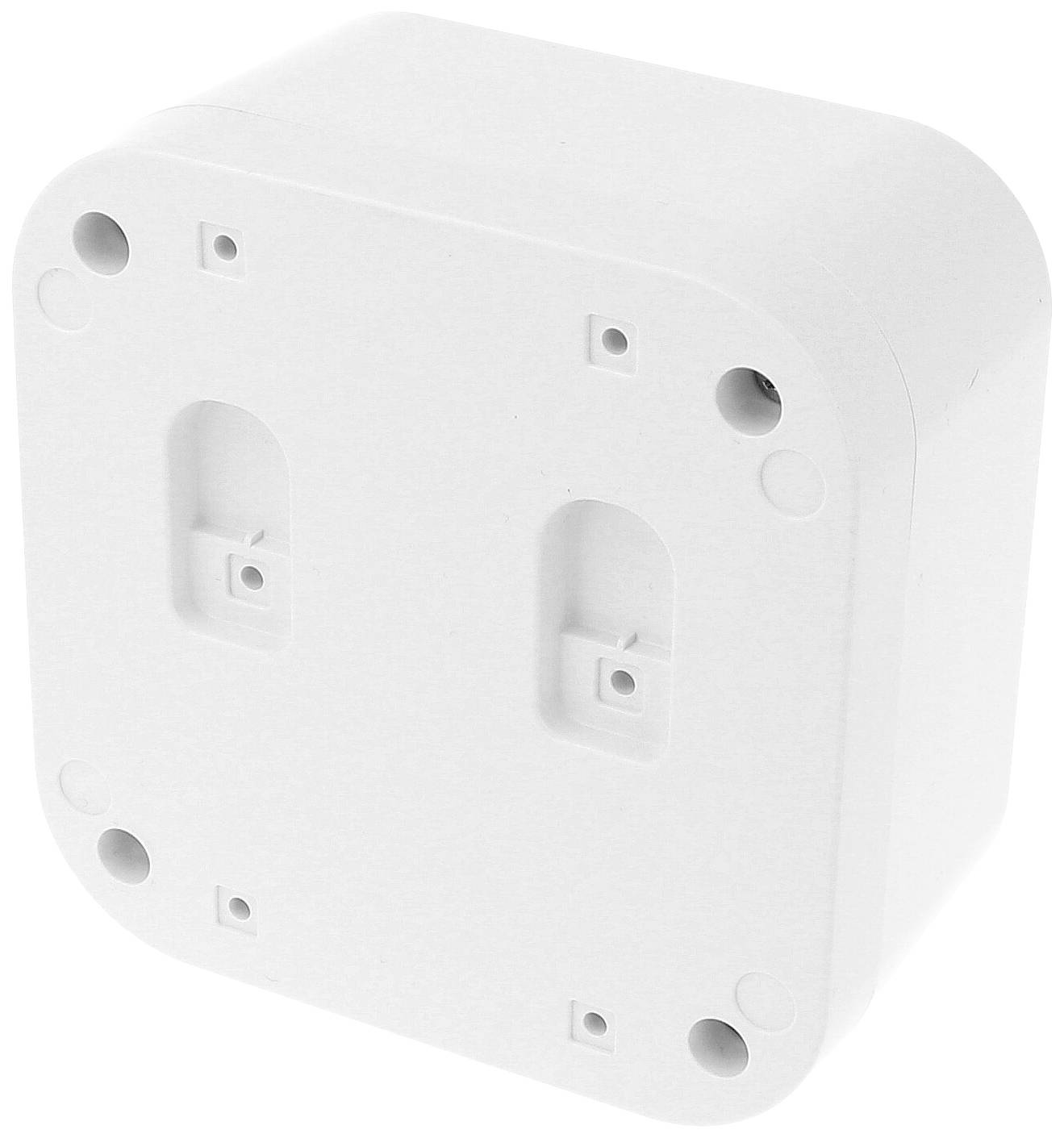 Boîte en plastique blanc, carrée, avec des angles arrondis et plusieurs trous de fixation.
