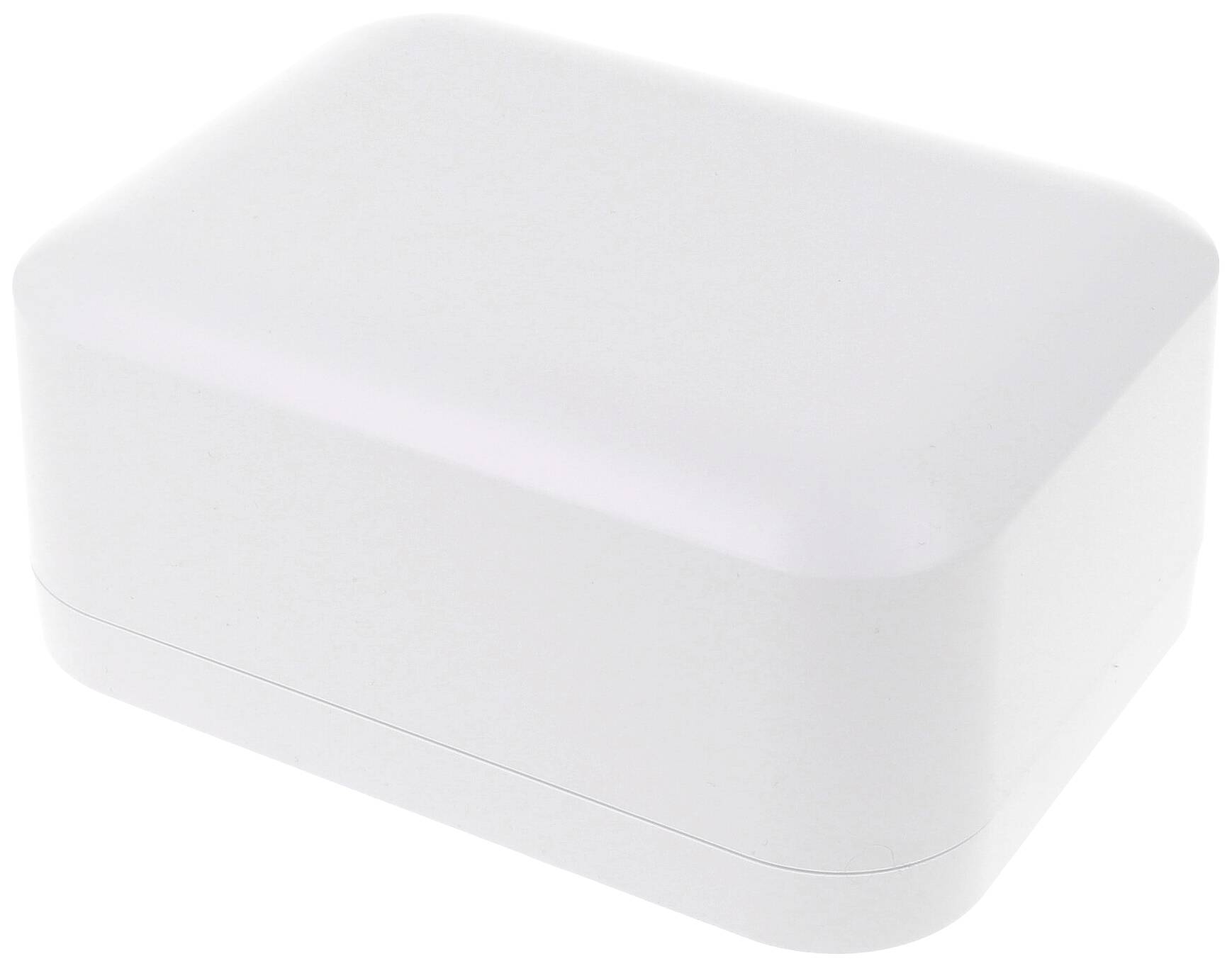 Boîte rectangulaire blanche aux coins arrondis, à la surface légèrement brillante.