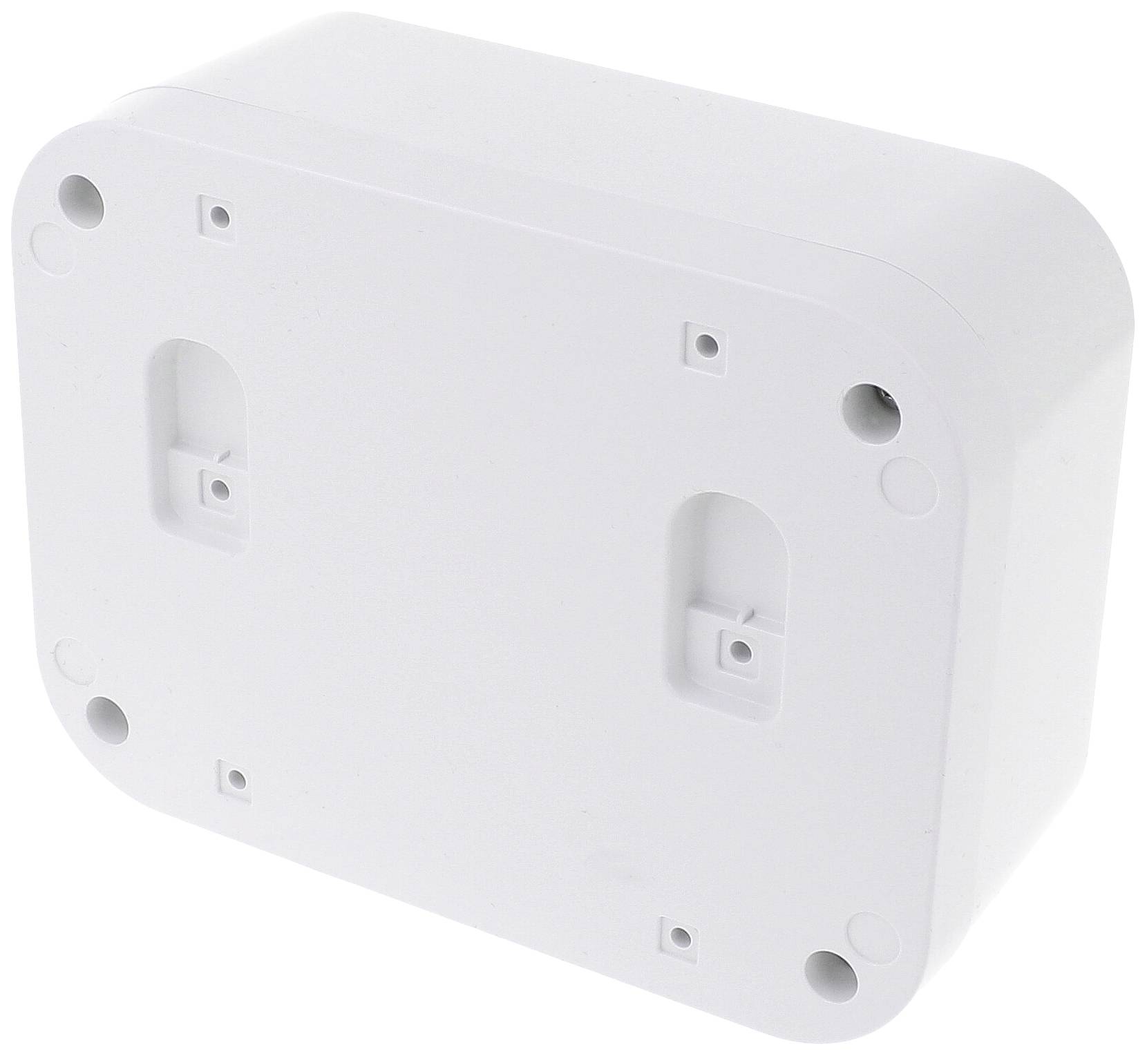 Un boîtier rectangulaire en plastique blanc aux coins arrondis, présentant plusieurs trous de vis sur sa surface.