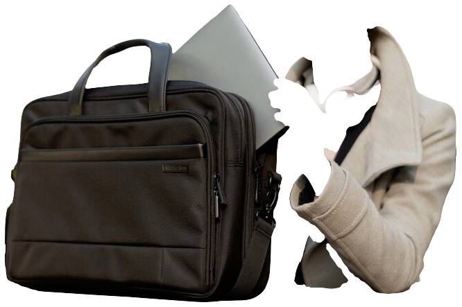 Une personne dans un manteau clair range un ordinateur portable dans une serviette noire.