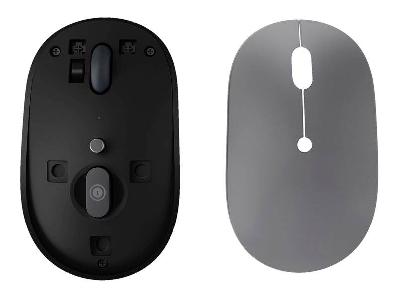 Deux souris d'ordinateur côte à côte : à gauche, le dessous avec son capteur et ses boutons, à droite, le dessus au design épuré.