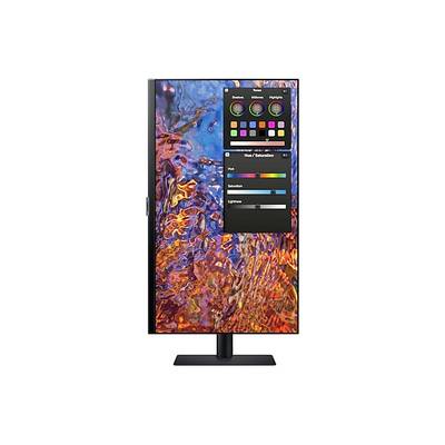 Un moniteur vertical affiche un programme de retouche d'image avec une sélection de couleurs et des curseurs pour la teinte, la saturation et la luminosité.