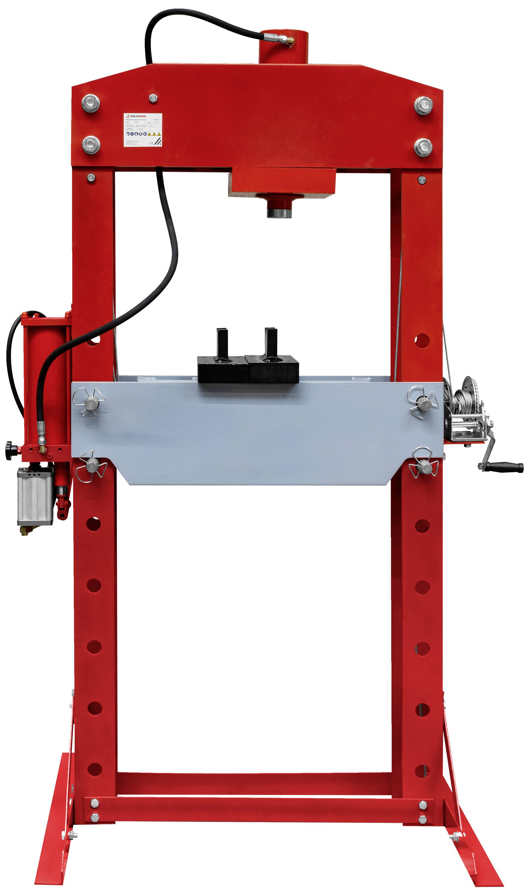 Presse hydraulique rouge avec levier et manomètre, utilisée pour déformer ou comprimer des matériaux dans les ateliers.