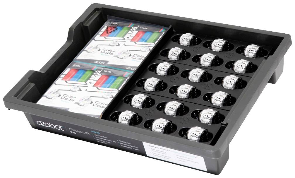 Un plateau en plastique ouvert contient des robots Ozobot noirs et blancs et plusieurs packages de codes colorés.